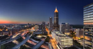 Atlanta, Georgia skyline at dusk with traffic trails.